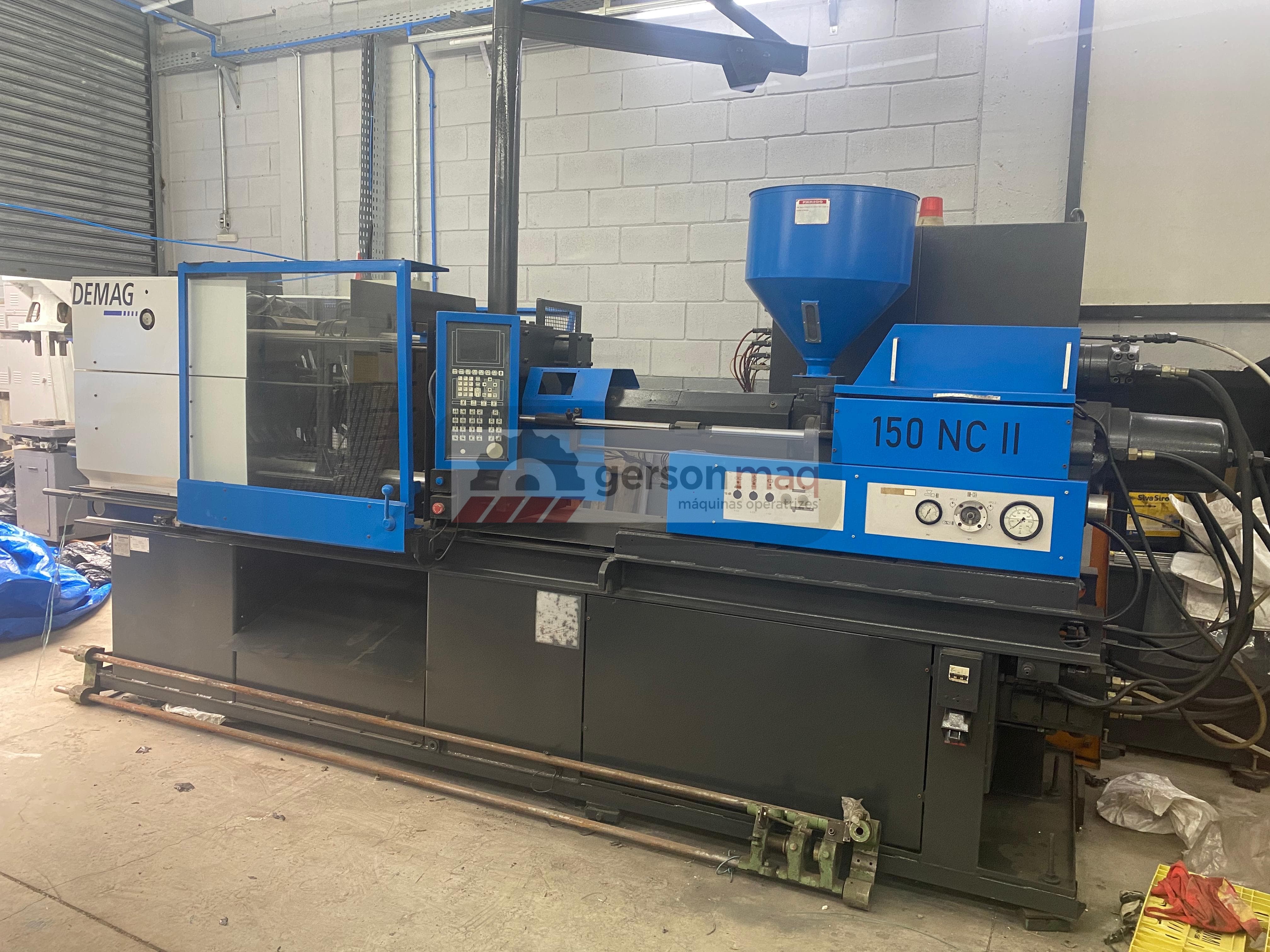 INJETORA DE PLÁSTICO DEMAG D150-452 150 TONELADAS